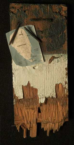 FRAGMENT 9 ¼” x 4” x ½” found wood; encaustic; newspaper; Arches